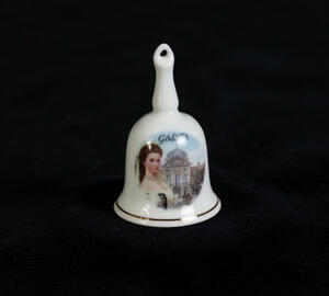 mini bell with picture of Sisi and palace of Gödöllő